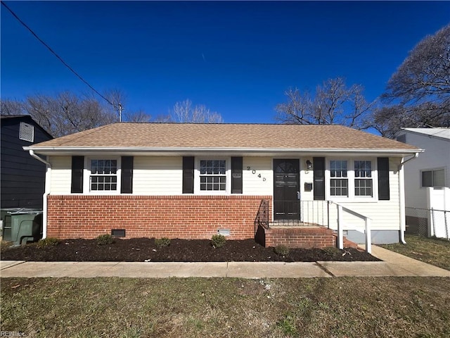 ranch-style home with a front lawn