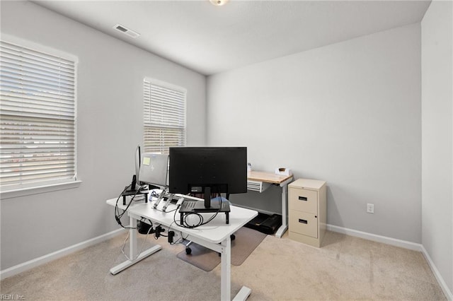 home office with light carpet