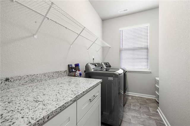 laundry area featuring washer and dryer