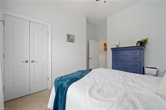 bedroom featuring ceiling fan and a closet