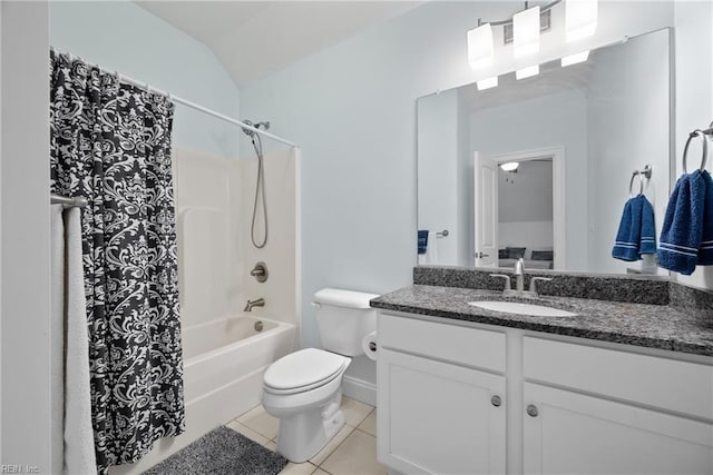 full bathroom with lofted ceiling, vanity, shower / bath combination with curtain, tile patterned floors, and toilet