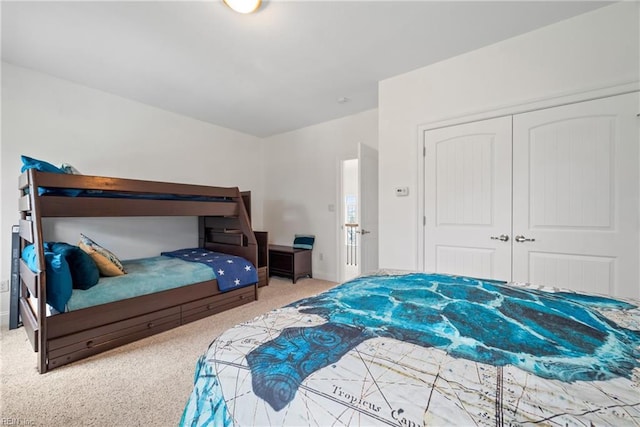 bedroom featuring a closet and carpet