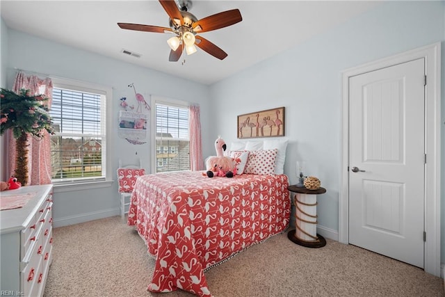 carpeted bedroom featuring ceiling fan