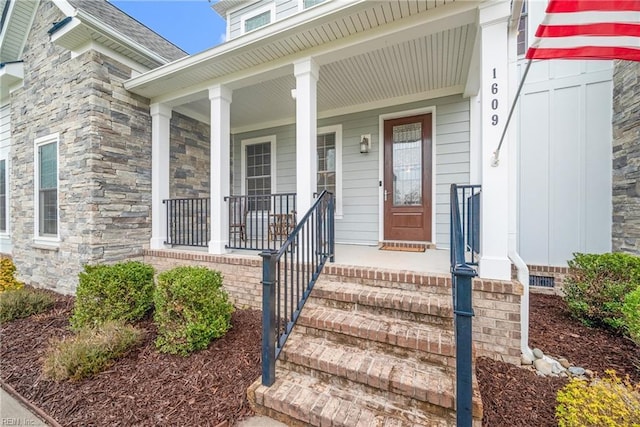 property entrance featuring a porch