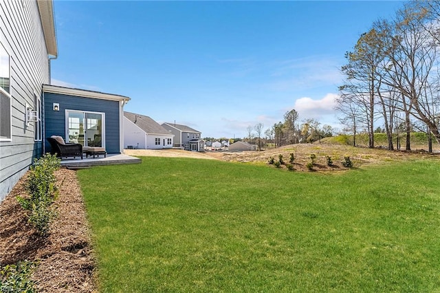 129 Getty Rd, Suffolk, VA 23434 - view of green lawn with a patio area