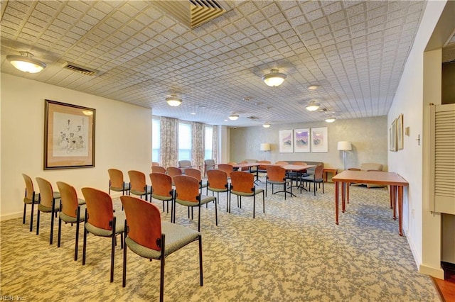 view of carpeted dining space