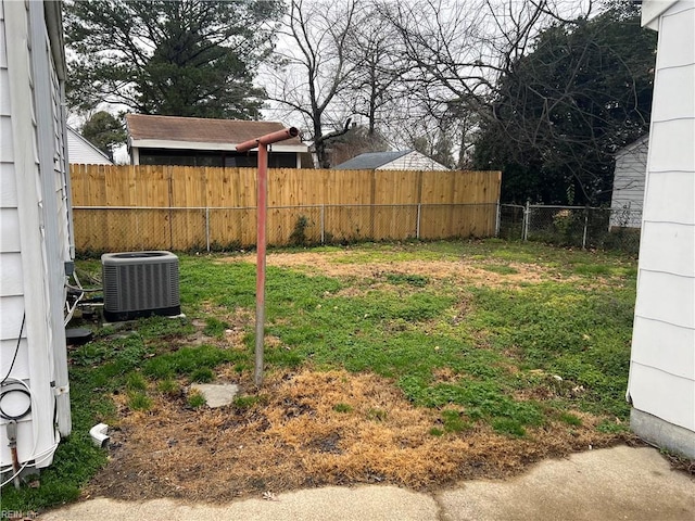 view of yard featuring central AC