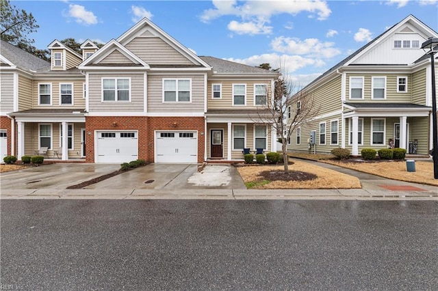 townhome / multi-family property featuring a garage