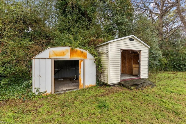 view of outbuilding featuring a lawn