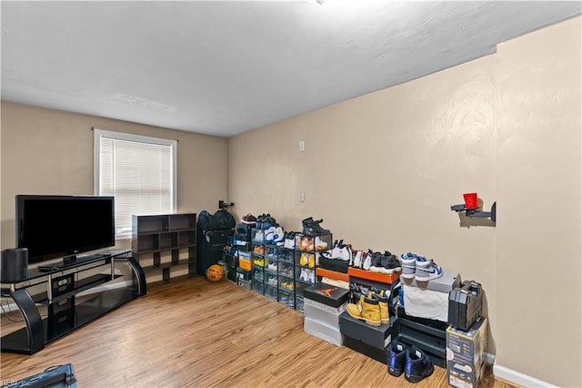 home office with wood-type flooring