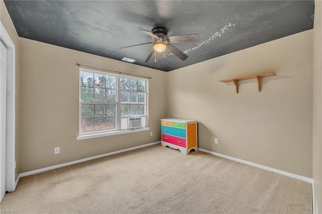 unfurnished bedroom featuring cooling unit, ceiling fan, and carpet flooring