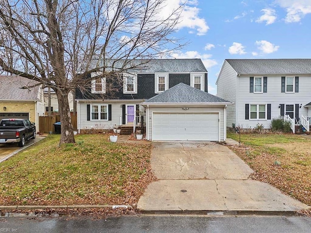 view of front facade with a garage and a front yard