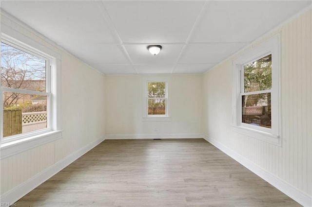 spare room with light wood-type flooring