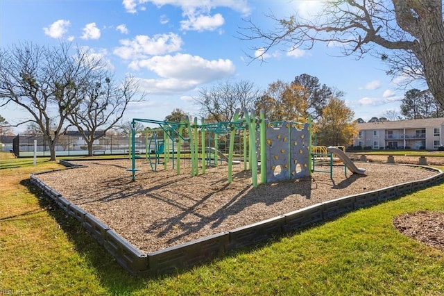 view of jungle gym featuring a yard