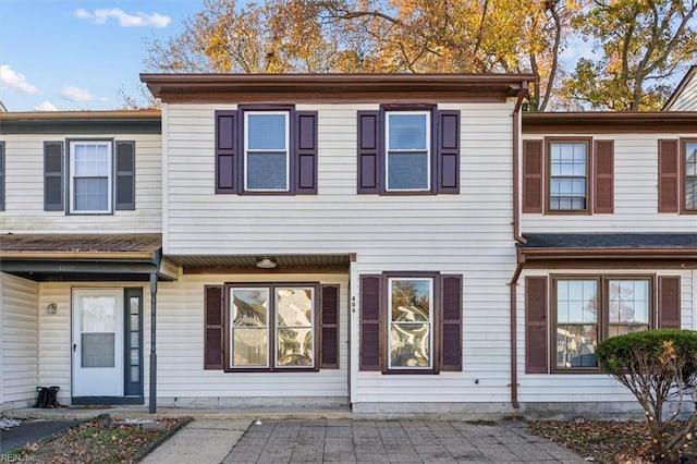 townhome / multi-family property featuring a patio area