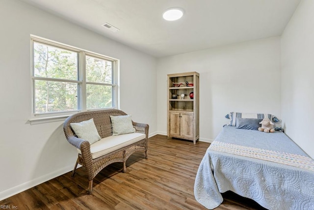 bedroom featuring hardwood / wood-style floors