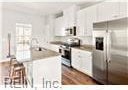 kitchen featuring appliances with stainless steel finishes and white cabinets