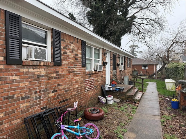 view of home's exterior with cooling unit