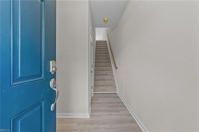 foyer with light hardwood / wood-style floors