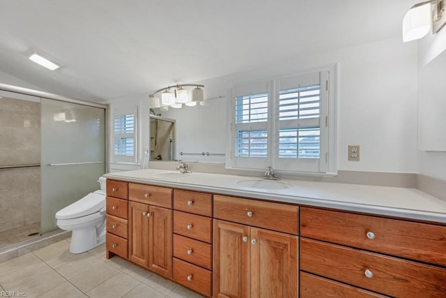 bathroom featuring vanity, an enclosed shower, tile patterned flooring, and toilet