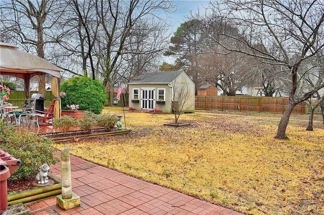 view of yard with an outbuilding and a gazebo