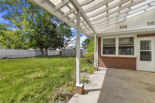 37 Lancaster Ter, Hampton, VA 23666 - view of yard with a patio, visible vents, and fence
