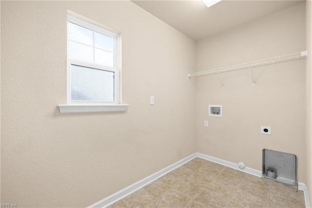 clothes washing area featuring hookup for a gas dryer, washer hookup, and hookup for an electric dryer