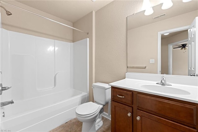 full bathroom featuring tile patterned flooring, vanity, shower / bathtub combination, and toilet