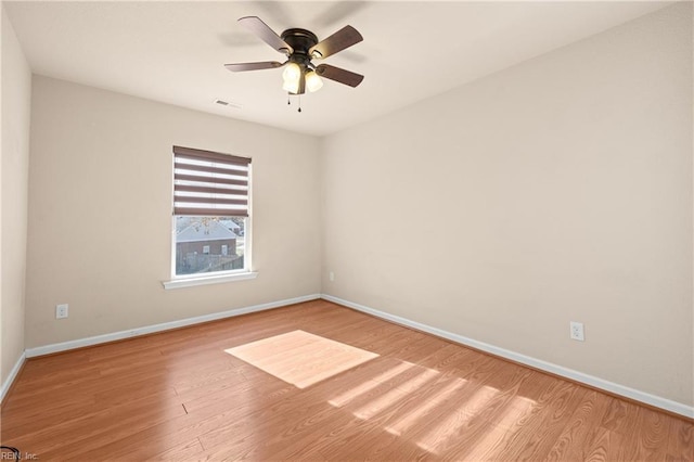 unfurnished room with light hardwood / wood-style floors and ceiling fan