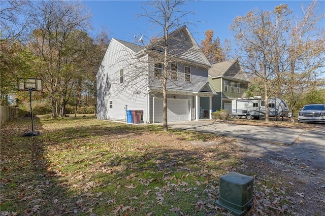 view of property exterior featuring a garage