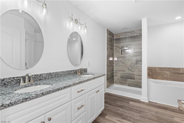 236 Buxton Ave, Newport News, VA 23607 - bathroom with hardwood / wood-style flooring, vanity, and independent shower and bath