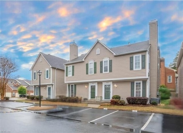 view of front of house featuring central AC