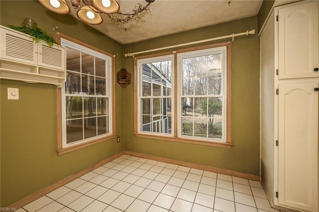 unfurnished sunroom featuring a wealth of natural light