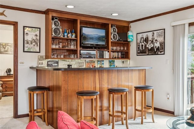 bar with ornamental molding and light colored carpet