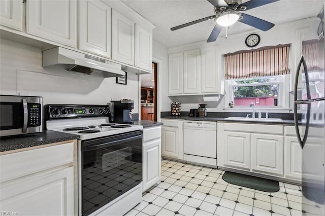 kitchen with sink, black refrigerator, white cabinetry, electric range, and white dishwasher