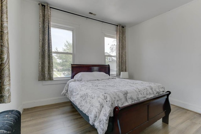 bedroom featuring hardwood / wood-style flooring