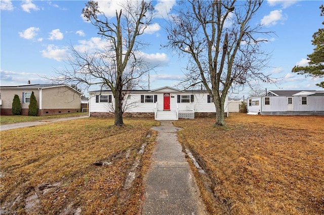 view of front of home with a front yard