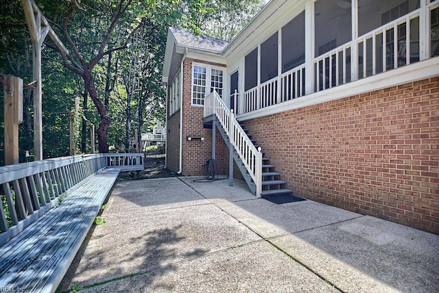 view of home's exterior with a patio area