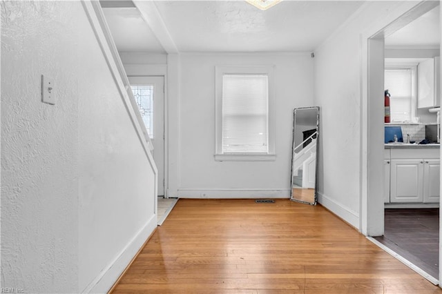 hall featuring light hardwood / wood-style flooring