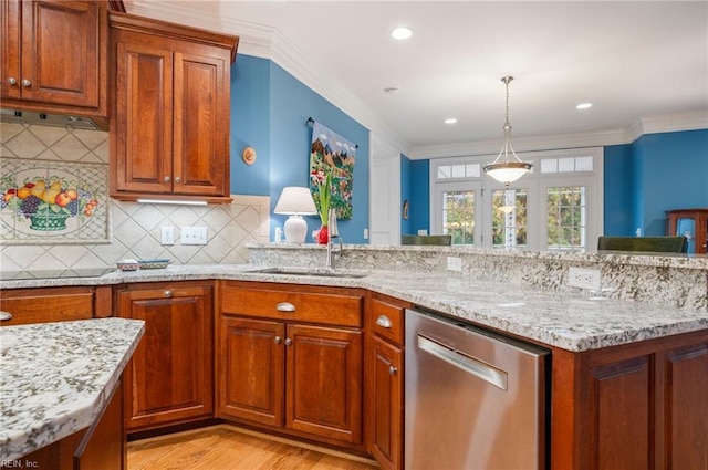 kitchen featuring brown cabinets, crown molding, and stainless steel dishwasher