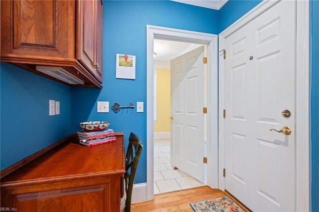 foyer entrance with light wood-style flooring