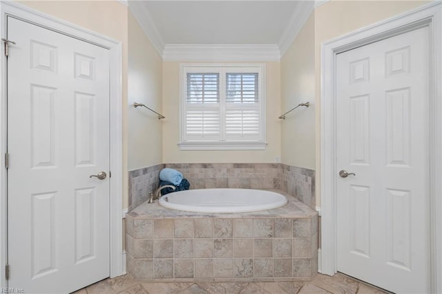 full bathroom with a bath and crown molding