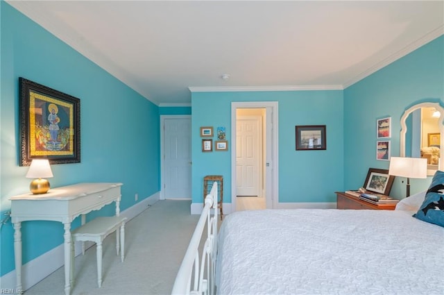 bedroom with light carpet, baseboards, and ornamental molding