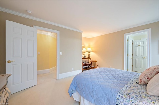 carpeted bedroom featuring ornamental molding and baseboards