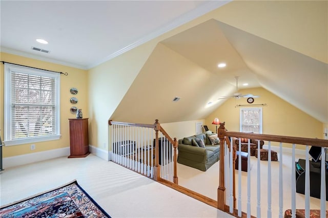 bonus room with carpet, visible vents, plenty of natural light, and baseboards