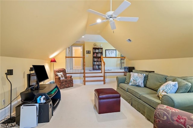 living area with ceiling fan, visible vents, baseboards, vaulted ceiling, and carpet