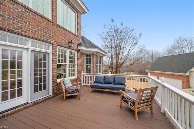 wooden deck with outdoor lounge area