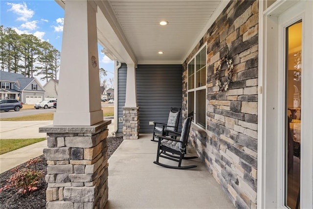 view of patio featuring a porch