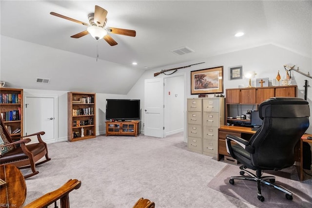 office space featuring ceiling fan, light colored carpet, and vaulted ceiling