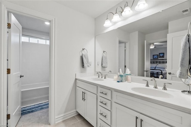 bathroom featuring vanity, tile patterned floors, ceiling fan, and  shower combination